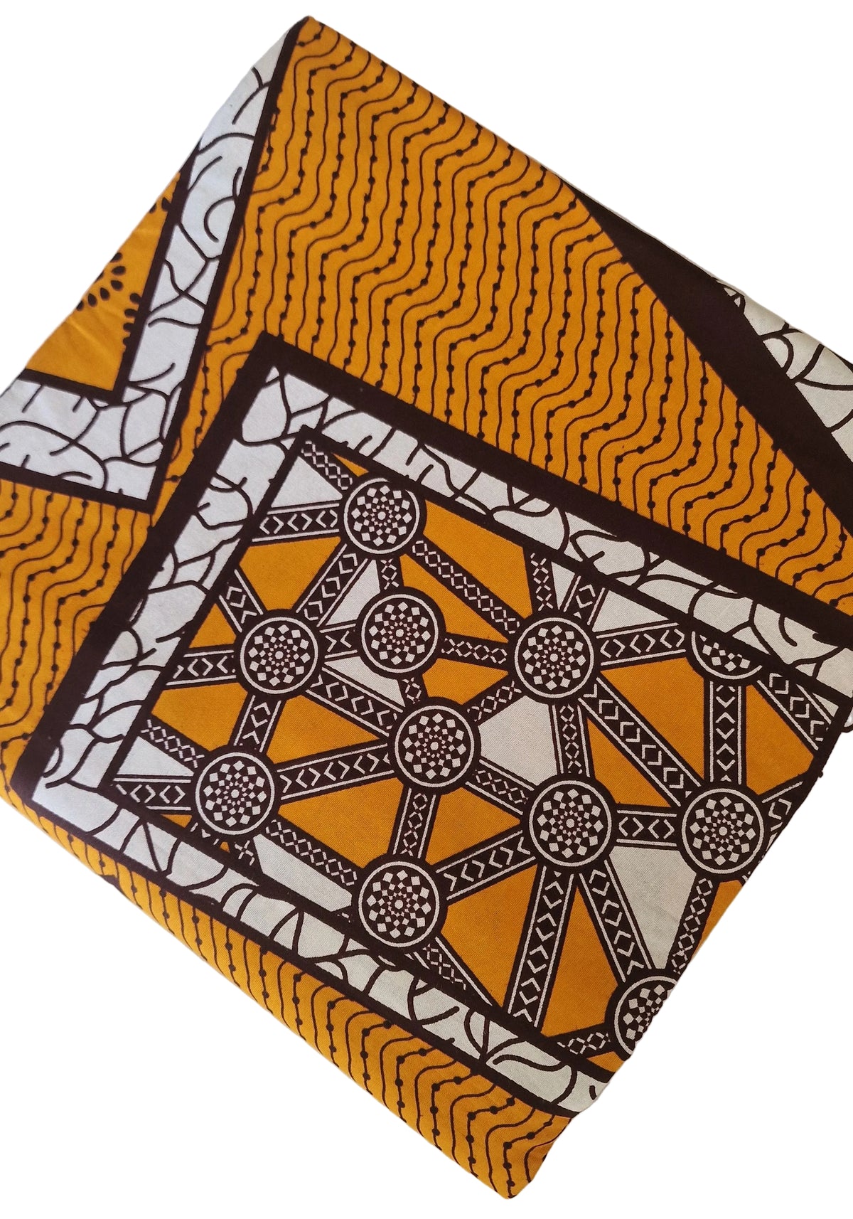 Patterned Ankara print featuring bold geometric and ornamental motifs in mustard yellow, white and dark brown
