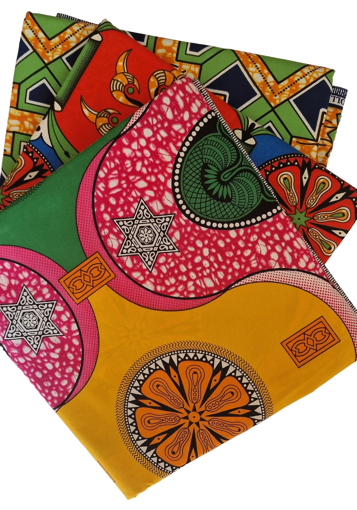 Bold African wax print pattern, featuring large overlapping circles and floral motifs in pink, yellow, green, orange, and black. 