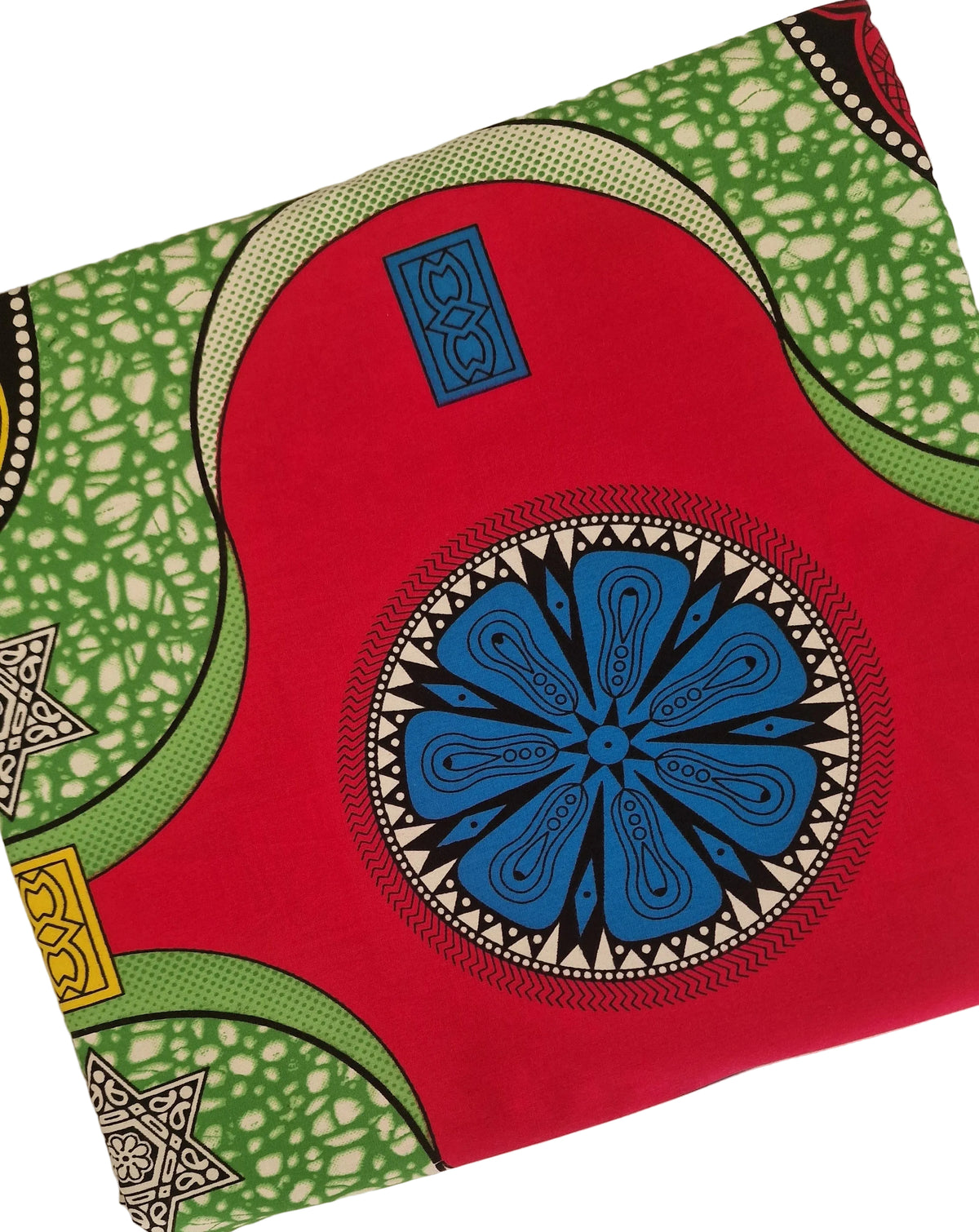 Vibrant African wax print fabric featuring a bold geometric pattern with large red, green, and blue circular shapes and intricate black and yellow details.