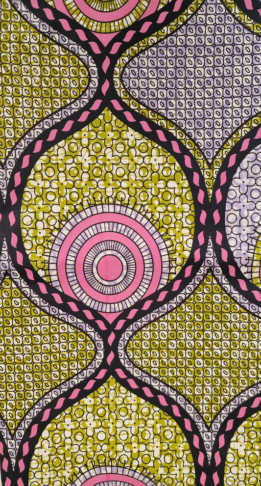 African wax patterned fabric featuring a bold geometric and circular design in olive green, pink, black, and white, with a repeating trellis motif.
