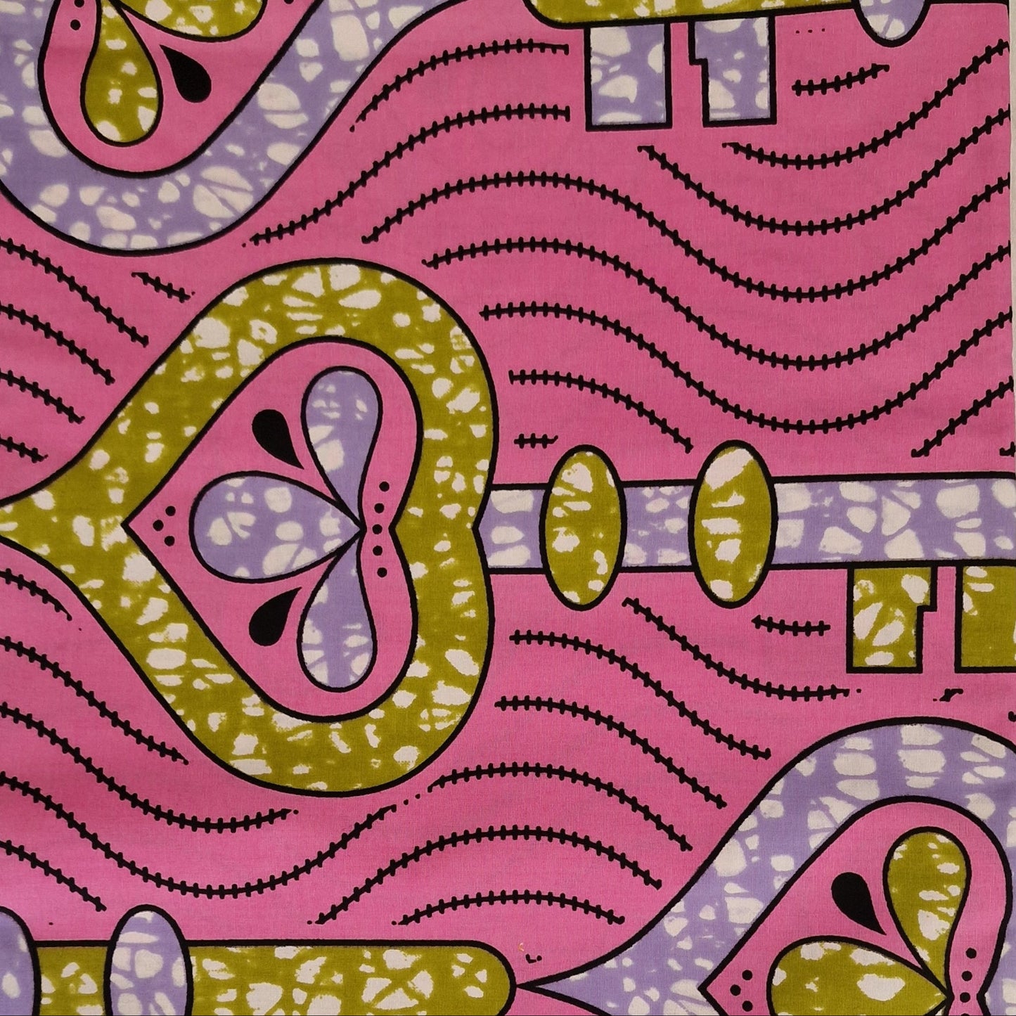 Vibrant African wax print fabric featuring a retro wavy pattern in pink, lime green, lavender purple, and black key motif.